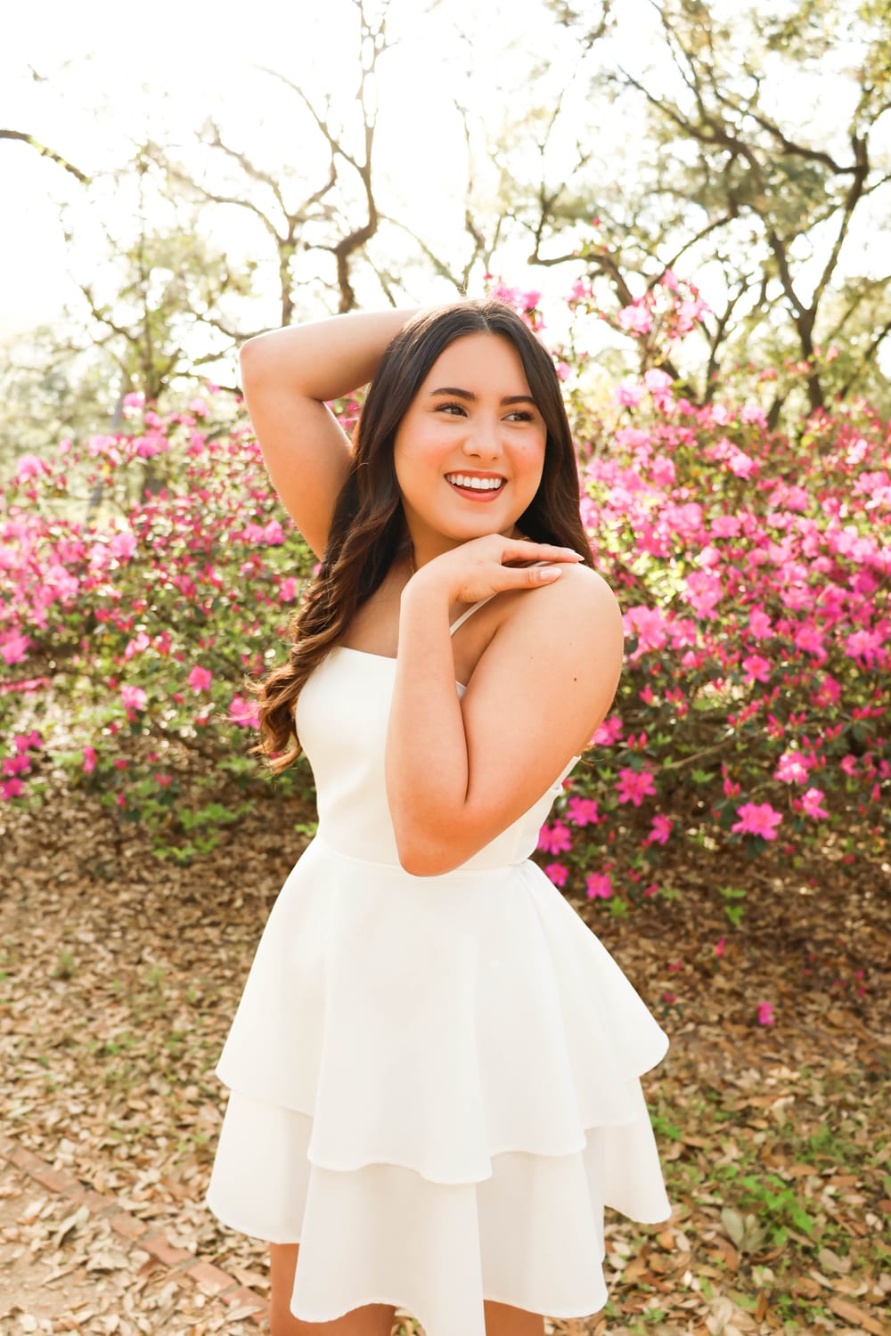 Senior portrait among azaleas